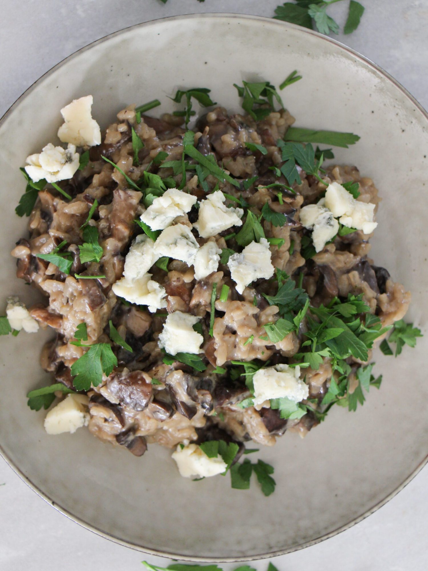 Risotto uit de oven met kastanje champignons en gorgonzola